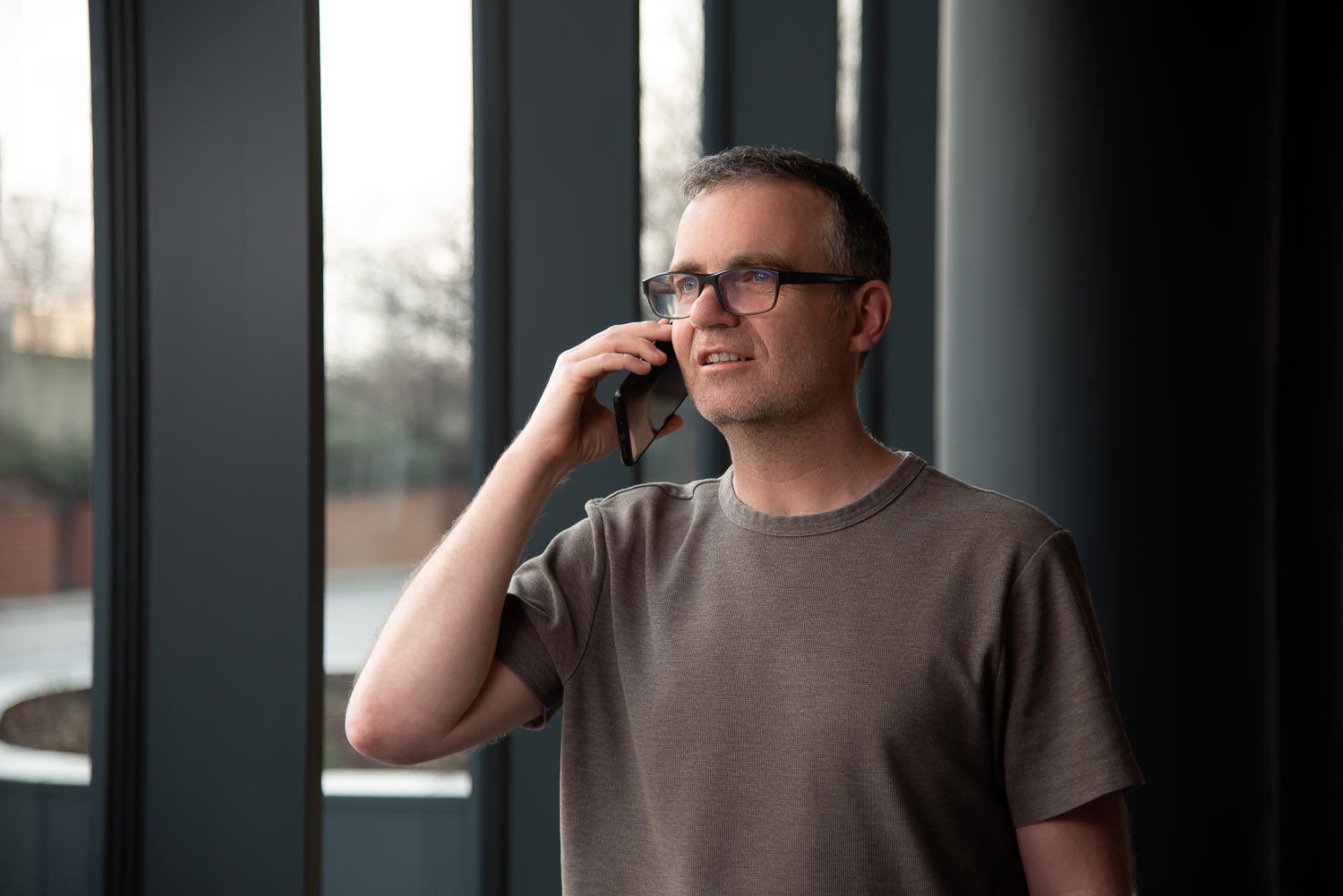 Compax Telco Consultant on the phone